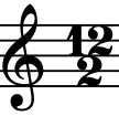 treble clef with the time signature 12 over 2